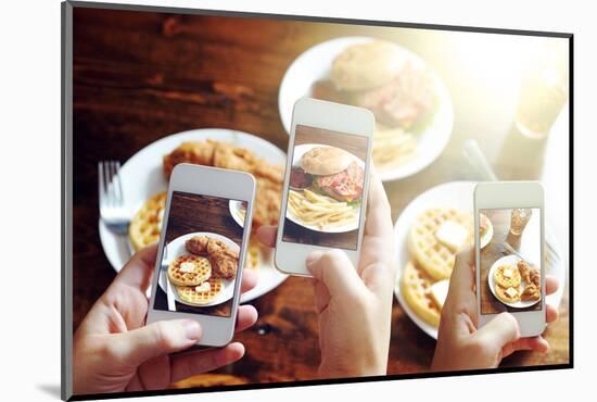 Friends Using Smartphones to Take Photos of Food with Instagram Style Filter-evren_photos-Mounted Photographic Print