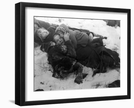 Frightened Children Taking Cover in the Woods During Russian Air Raid-Carl Mydans-Framed Photographic Print
