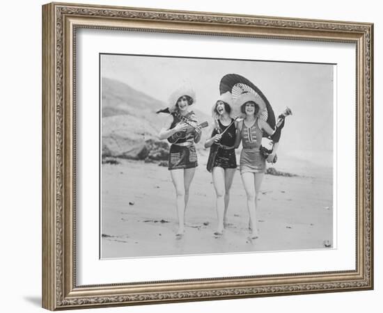 Frolicsome Trio of American Bathing Beauties Wearing the Latest Swimsuit Costumes-Emil Otto Hopp?-Framed Photographic Print