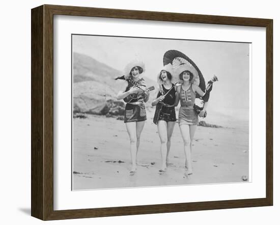 Frolicsome Trio of American Bathing Beauties Wearing the Latest Swimsuit Costumes-Emil Otto Hopp?-Framed Photographic Print