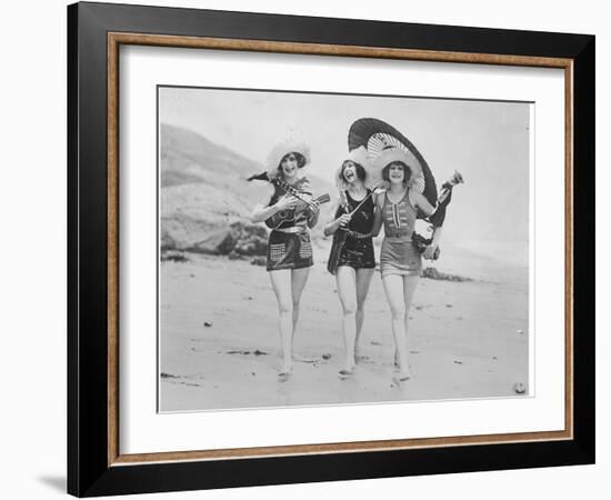 Frolicsome Trio of American Bathing Beauties Wearing the Latest Swimsuit Costumes-Emil Otto Hopp?-Framed Photographic Print