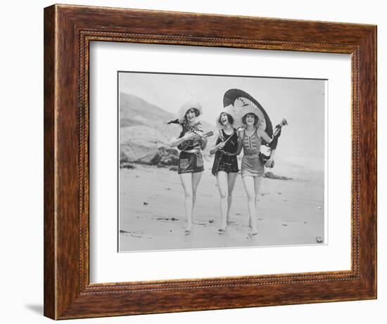 Frolicsome Trio of American Bathing Beauties Wearing the Latest Swimsuit Costumes-Emil Otto Hopp?-Framed Photographic Print