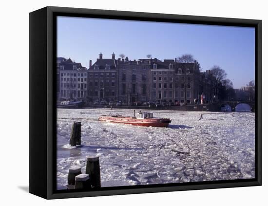 Frozen Canal and Boat, Amsterdam, Netherlands-Michele Molinari-Framed Premier Image Canvas