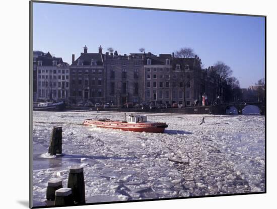 Frozen Canal and Boat, Amsterdam, Netherlands-Michele Molinari-Mounted Photographic Print