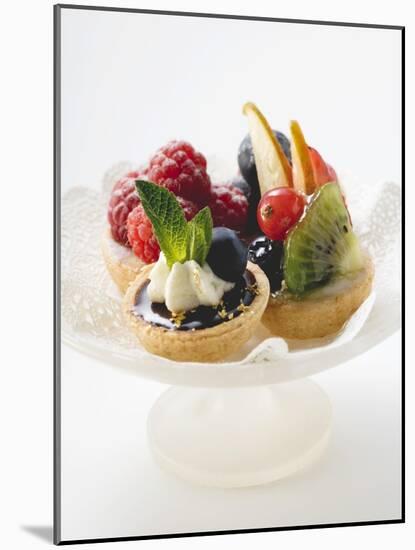 Fruit Tarts on a Pedestal Cake Stand-null-Mounted Photographic Print