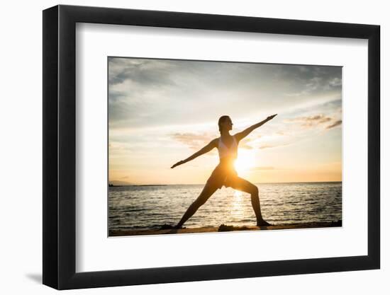 Full Length Side View of the Silhouette of a Fit Woman Practicing the Warrior Yoga Pose against Sky-Kzenon-Framed Photographic Print