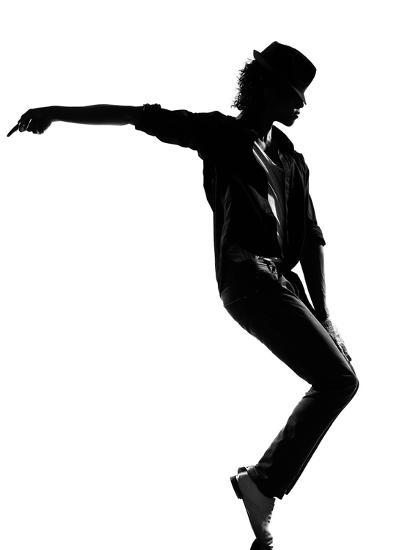 Full Length Silhouette Of A Young Man Dancer Dancing Funky Hip Hop