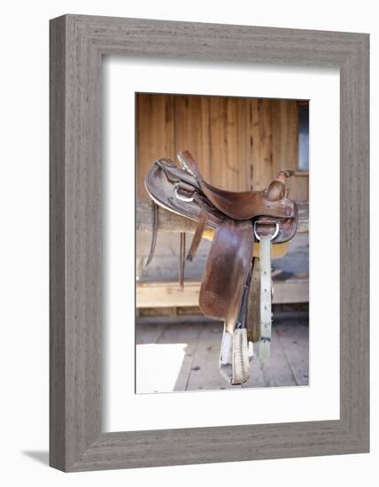 Full view of a Saddle resting on the railing, Tucson, Arizona, USA.-Julien McRoberts-Framed Photographic Print
