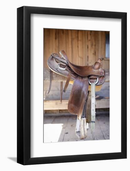 Full view of a Saddle resting on the railing, Tucson, Arizona, USA.-Julien McRoberts-Framed Photographic Print