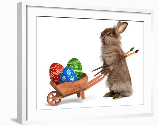 Funny Easter Bunny Rabbit With A Wheelbarrow And Some Easter Eggs-mdorottya-Framed Photographic Print