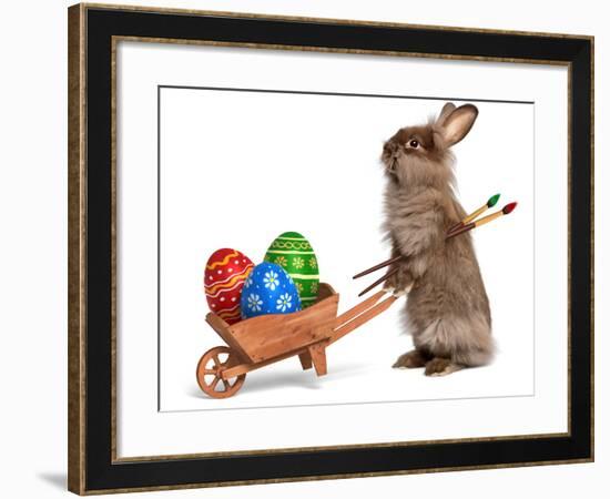 Funny Easter Bunny Rabbit With A Wheelbarrow And Some Easter Eggs-mdorottya-Framed Photographic Print