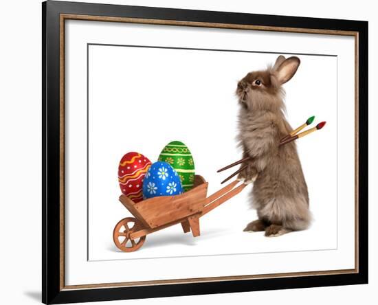 Funny Easter Bunny Rabbit With A Wheelbarrow And Some Easter Eggs-mdorottya-Framed Photographic Print