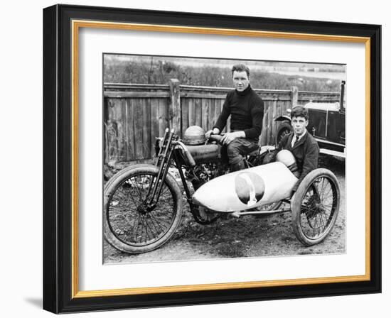 FW Dixon on a Harley-Davidson, with a Passenger in the Sidecar, 1921-null-Framed Photographic Print