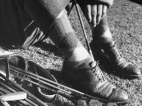 Golfer Byron Nelson Cleaning the Cleats on His Shoes-Gabriel Benzur-Premium Photographic Print