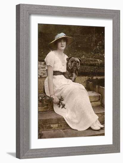 Gabrielle Ray, English Actress, with a Dog in a Garden-null-Framed Photographic Print