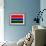 Gambia Flag Design with Wood Patterning - Flags of the World Series-Philippe Hugonnard-Framed Premium Giclee Print displayed on a wall