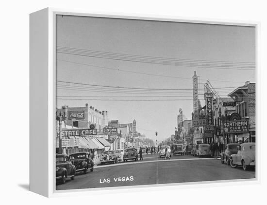 Gambling Establishments and Clubs Lining the Street-Peter Stackpole-Framed Premier Image Canvas