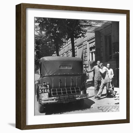 Gangster Charles "Lucky" Luciano Hurrying Toward His Car-null-Framed Photographic Print