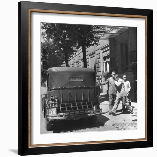 Gangster Charles "Lucky" Luciano Hurrying Toward His Car-null-Framed Photographic Print