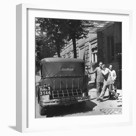 Gangster Charles "Lucky" Luciano Hurrying Toward His Car-null-Framed Photographic Print