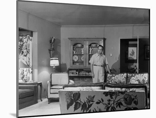 Gangster Mickey Cohen Standing in His Lavishly Furnished Living Room-Ed Clark-Mounted Photographic Print