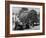 Garbage Man Emptying Trash into Back of Garbage Truck-Alfred Eisenstaedt-Framed Photographic Print