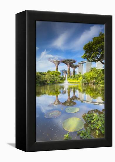 Gardens by the Bay and Marina Bay Sands Hotel, Singapore-Ian Trower-Framed Premier Image Canvas