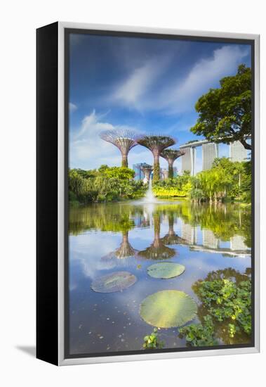 Gardens by the Bay and Marina Bay Sands Hotel, Singapore-Ian Trower-Framed Premier Image Canvas