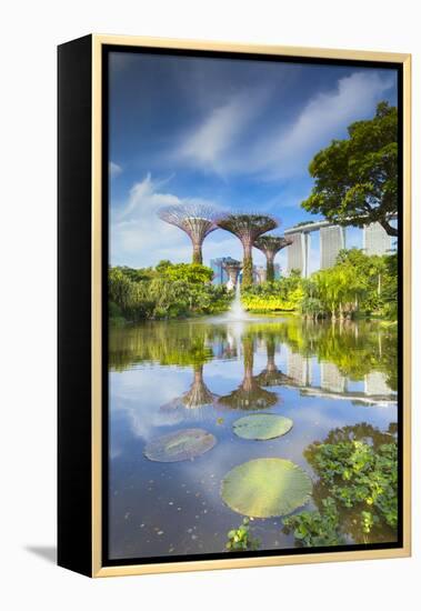 Gardens by the Bay and Marina Bay Sands Hotel, Singapore-Ian Trower-Framed Premier Image Canvas