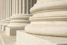 The Flag of the USA Flying in Front of the Capitol Building in Washington, Dc.-Gary Blakeley-Photographic Print