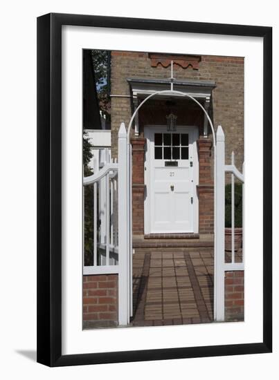 Gates Leading to Block Paving, and a White Front Door, of a Residential House-Natalie Tepper-Framed Photo