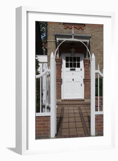 Gates Leading to Block Paving, and a White Front Door, of a Residential House-Natalie Tepper-Framed Photo