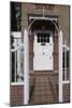 Gates Leading to Block Paving, and a White Front Door, of a Residential House-Natalie Tepper-Mounted Photo