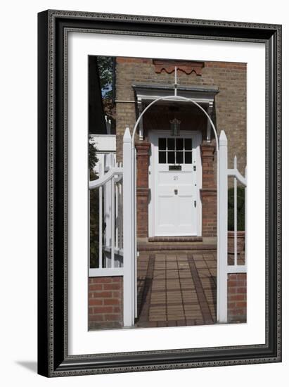 Gates Leading to Block Paving, and a White Front Door, of a Residential House-Natalie Tepper-Framed Photo