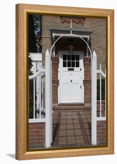 Gates Leading to Block Paving, and a White Front Door, of a Residential House-Natalie Tepper-Framed Stretched Canvas