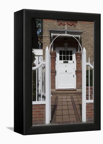 Gates Leading to Block Paving, and a White Front Door, of a Residential House-Natalie Tepper-Framed Stretched Canvas