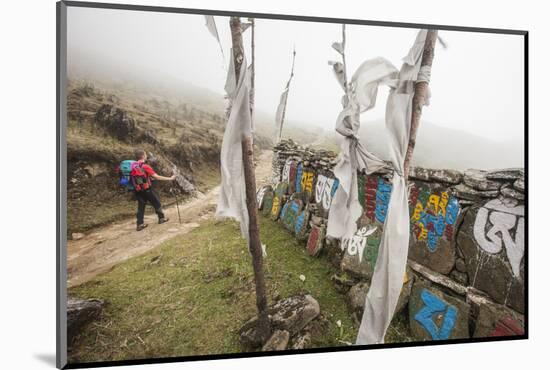 Gateway to Nepal with Flags and Buddhist Inscriptions Near the Village of Tumling, Nepal-Roberto Moiola-Mounted Photographic Print