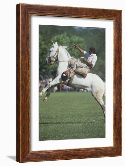 Gaucho Riding on Horseback in Argentina-null-Framed Photographic Print