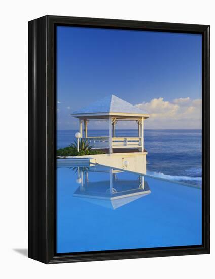 Gazebo Reflecting on Pool with Sea in Background, Long Island, Bahamas-Kent Foster-Framed Premier Image Canvas