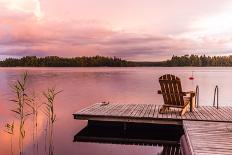 Wooden Lounge Chairs at Sunset on a Pier on the Shores of the Calm Saimaa Lake in Finland under a N-gdefilip-Mounted Photographic Print