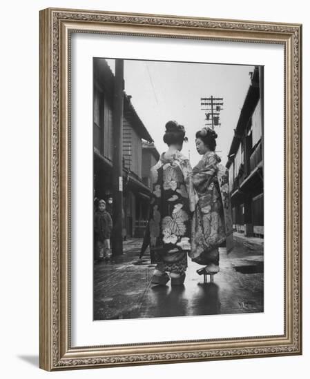 Geisha Girl Chats with Young Novice, Yoko Minami, Who is Studying to Become a Geisha-Alfred Eisenstaedt-Framed Photographic Print