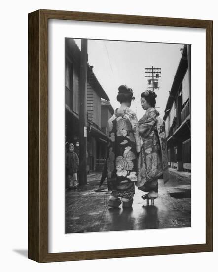 Geisha Girl Chats with Young Novice, Yoko Minami, Who is Studying to Become a Geisha-Alfred Eisenstaedt-Framed Photographic Print