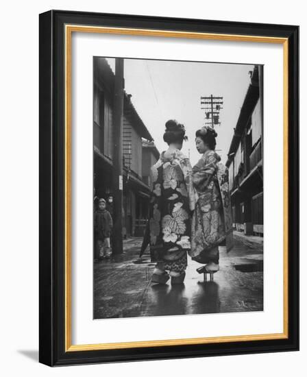 Geisha Girl Chats with Young Novice, Yoko Minami, Who is Studying to Become a Geisha-Alfred Eisenstaedt-Framed Photographic Print