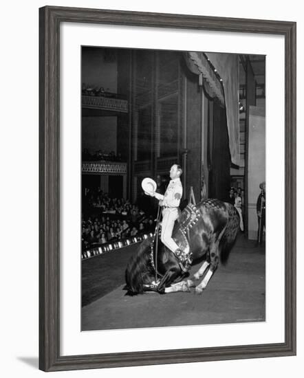 Gene Autry Astride His Famous Horse Champion on Bent Front Knees, Touching Head to Floor, on Stage-Thomas D^ Mcavoy-Framed Premium Photographic Print