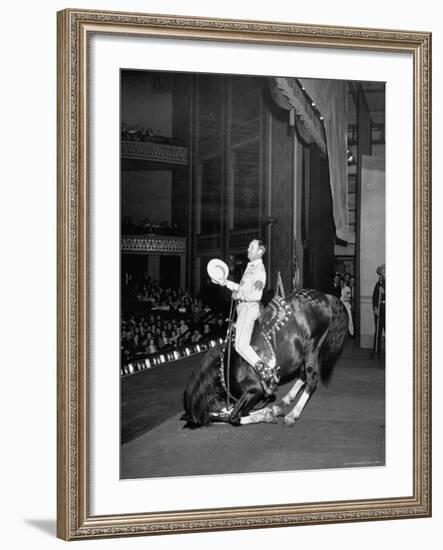 Gene Autry Astride His Famous Horse Champion on Bent Front Knees, Touching Head to Floor, on Stage-Thomas D^ Mcavoy-Framed Premium Photographic Print