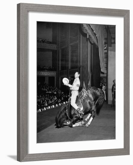 Gene Autry Astride His Famous Horse Champion on Bent Front Knees, Touching Head to Floor, on Stage-Thomas D^ Mcavoy-Framed Premium Photographic Print