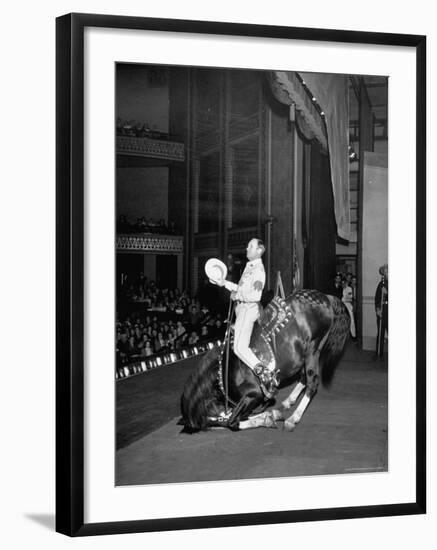 Gene Autry Astride His Famous Horse Champion on Bent Front Knees, Touching Head to Floor, on Stage-Thomas D^ Mcavoy-Framed Premium Photographic Print