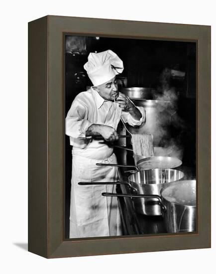 Gene Leone, Taking a Bite Test to Determine Whether the Bo Ling Spaghetti is Properly Firm-Eliot Elisofon-Framed Premier Image Canvas