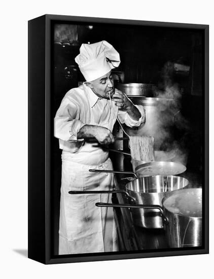 Gene Leone, Taking a Bite Test to Determine Whether the Bo Ling Spaghetti is Properly Firm-Eliot Elisofon-Framed Premier Image Canvas