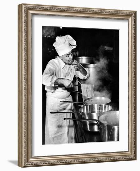 Gene Leone, Taking a Bite Test to Determine Whether the Bo Ling Spaghetti is Properly Firm-Eliot Elisofon-Framed Photographic Print